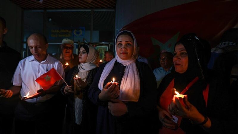 إضاءة الشموع بفلسطين حدادا على ضحايا زلزال الحوز